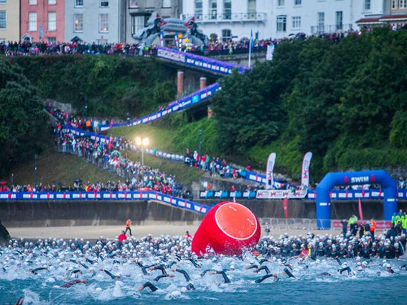 Swimmers take to the water in Ironman Wales